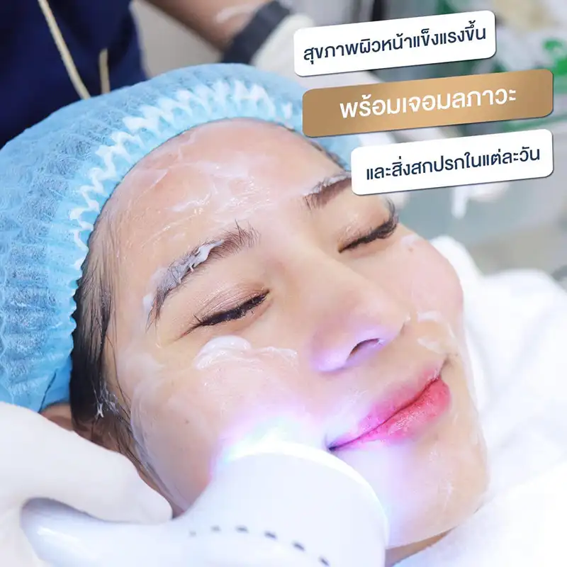 Hydrating facial with blue light LED therapy on relaxed client