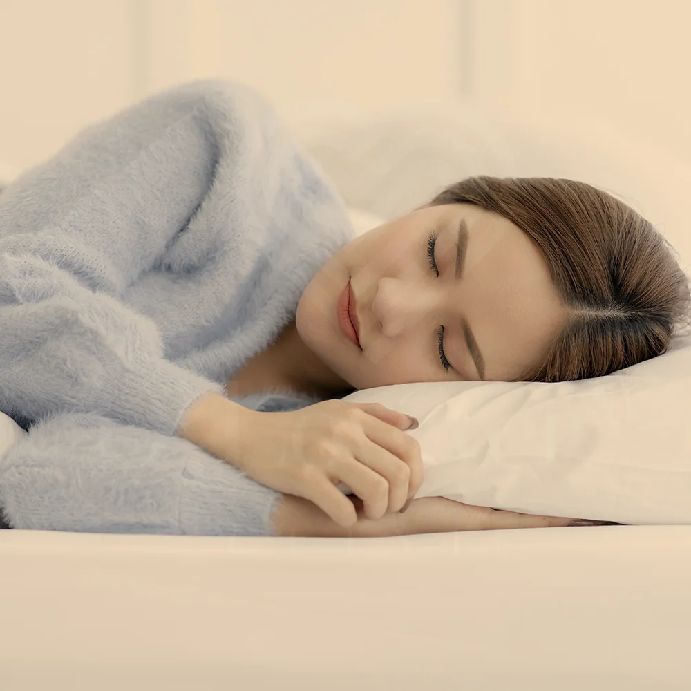 Close-up of person sleeping on side, face on pillow — side sleeping and facial wrinkles